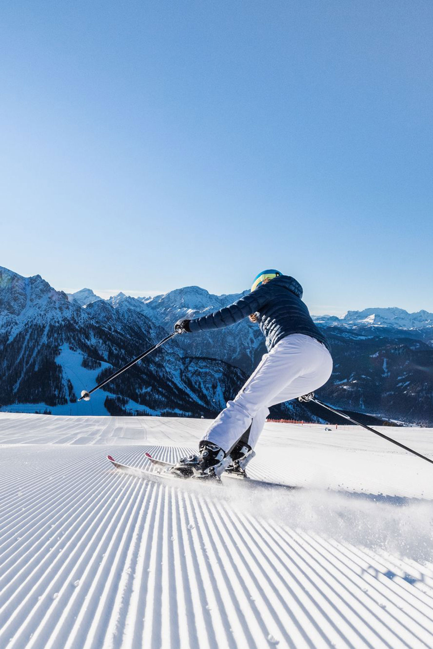 Skiing at Kronplatz portrait format - Hotel Fameli