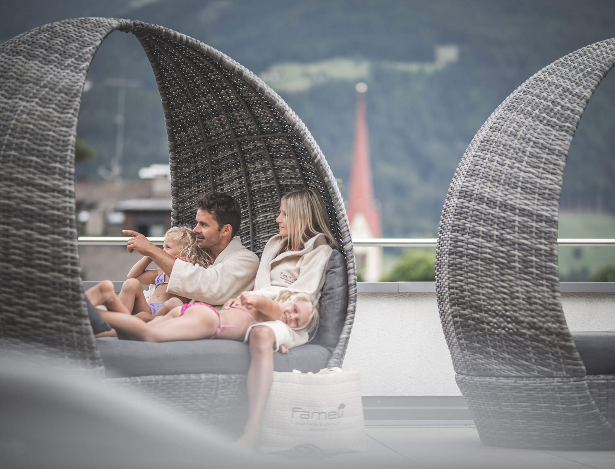 Family enjoying the lounge on the roof terrace - Hotel Fameli