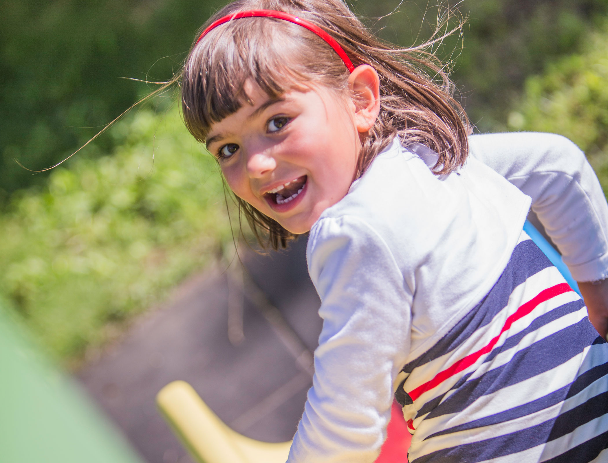 Girl having fun on the slide - Hotel Fameli